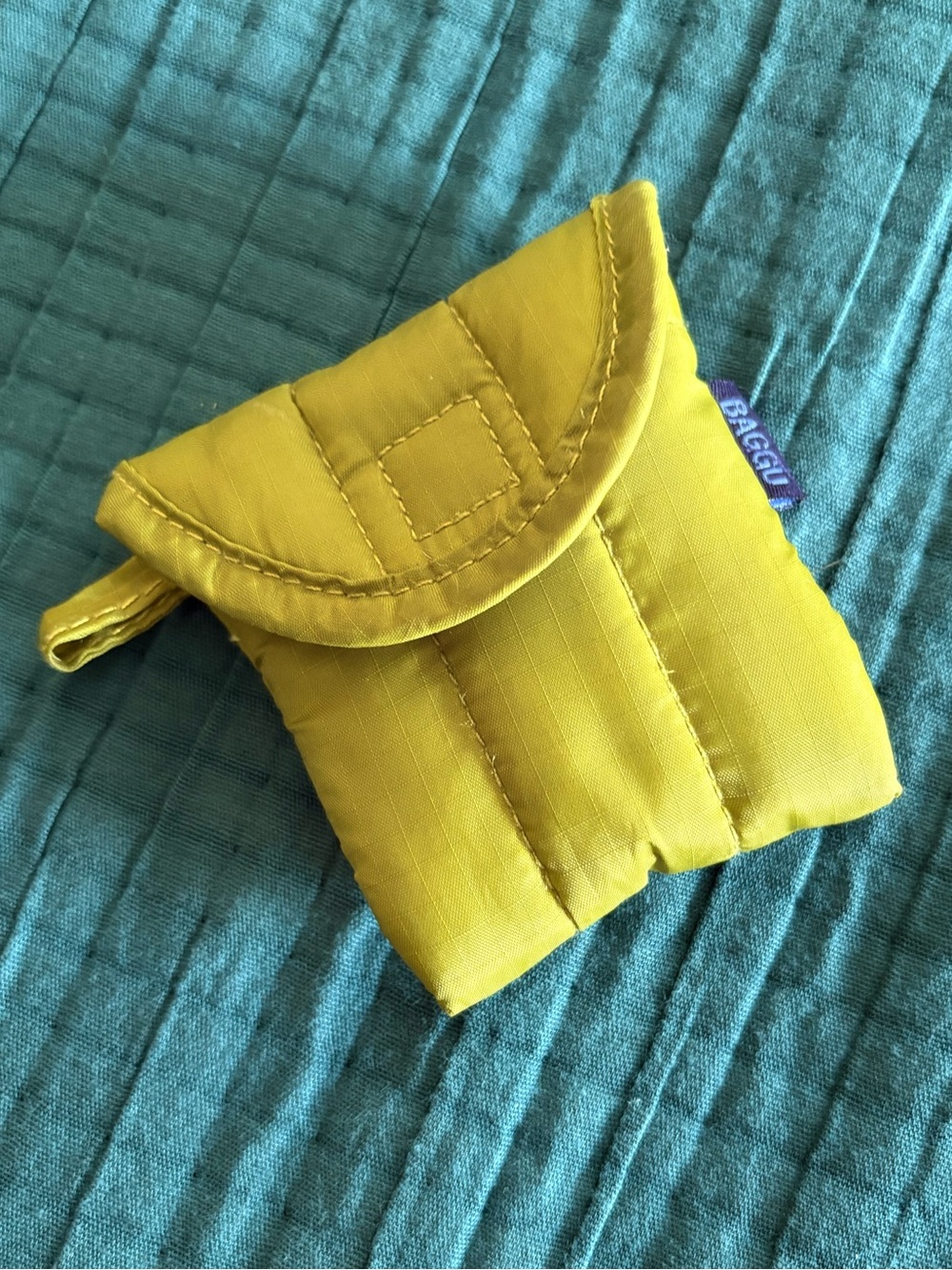 Baggu puffy earbuds case in Green Juice